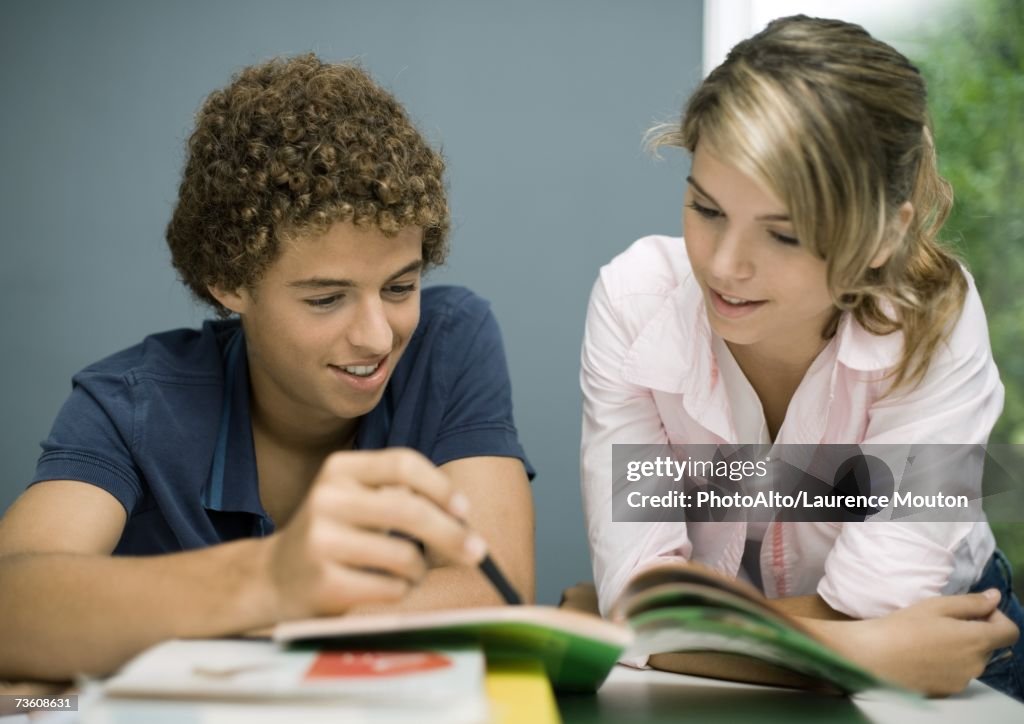 Homework Friend Adolescent Boy And Female Friend Doing Homework Foto de stock - Getty ...