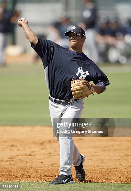 Alberto Gonzalez of the New York Yankees fields the ball during a Spring Traning game against the Pittsburgh Pirates on March 10, 2007 at McKechnie...