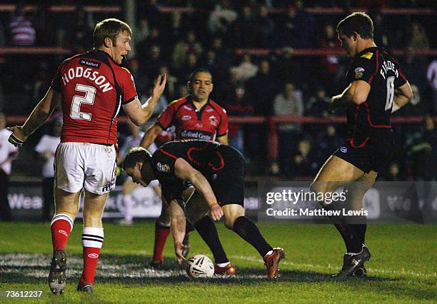 Chris Ashton of Wigan scores a try during the engage Super League match between Salford City Reds and Wigan Warriors at the Willows on March 16, 2007...