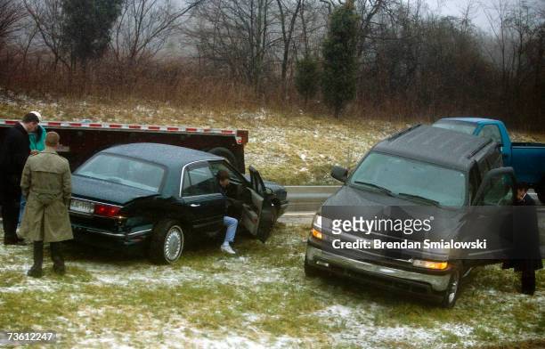 An SUV with U.S. President George W Bush's motorcade sits in the median after an accident on I-270 March 16, 2007 near Frederick, Maryland. President...