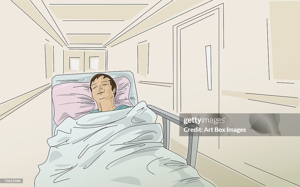 Male patient in a hospital bed