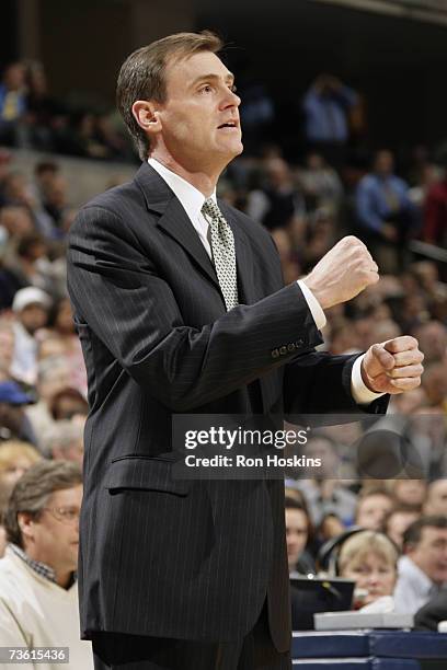 Head coach Rick Carlisle of the Indiana Pacers signals a play during the NBA game against the Phoenix Suns at Conseco Fieldhouse on February 27, 2007...