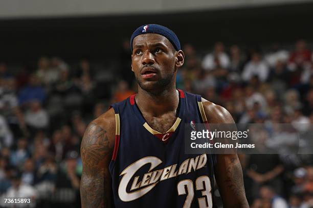 LeBron James of the Cleveland Cavaliers stands on the court during the NBA game against the Dallas Mavericks at American Airlines Center on March 1,...