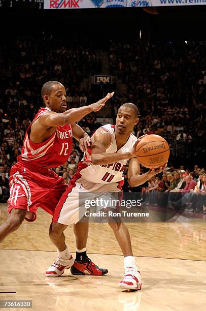 Ford of the Toronto Raptors looks to pass against Rafer Alston of the Houston Rockets on March 16, 2007 at the Air Canada Centre in Toronto, Canada....