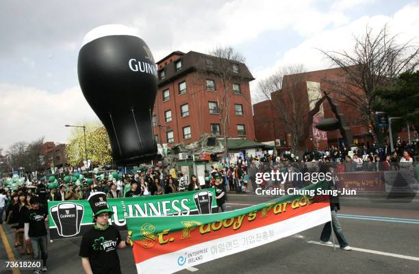 People enjoy a parade as part of the St. Patrick's Day celebrations on March 17, 2007 in Seoul, South Korea. St Patrick's Day is Ireland's National...