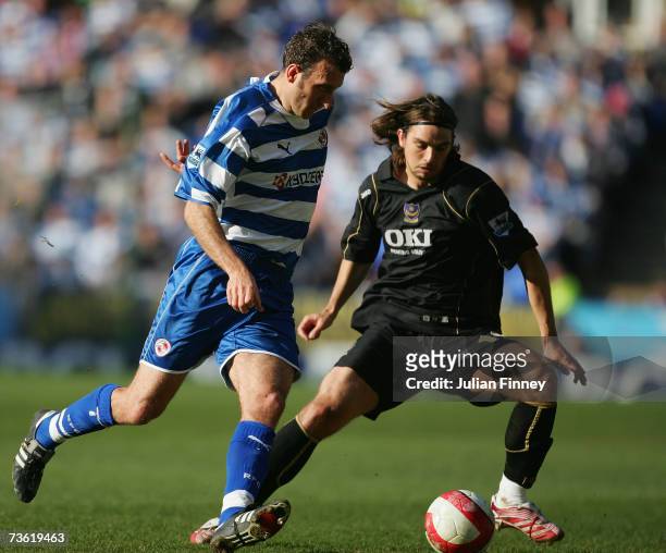Glen Little of Reading battles with Niko Kranjcar of Portsmouth during the Barclays Premiership match between Reading and Portsmouth at the Madejski...
