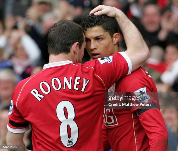 Cristiano Ronaldo and Wayne Rooney of Manchester United celebrate Ji-Sung Park scoring United's first goal during the Barclays Premiership match...