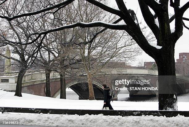 Somerville, UNITED STATES: Snow covers the ground by a bridge, 17 March 2007, on a street in Somerville, Massachusetts, a day after a snowstorm hit...