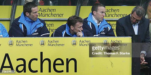 Goalkeeper coach Thomas Schlieck, assistant coach Dr. Joerg Weber, assistant coach Frank Geideck and head coach Ernst Middendorp of Bielefeld look...
