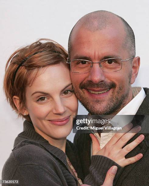 Actor Christoph Maria Herbst and his girlfriend Marie Zielcke pose for photographers during the premiere of the film "Haende Weg Von Mississippi" at...
