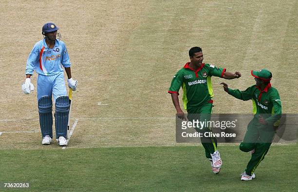 Mashrafe Mortaza of Bangladesh celebrates the wicket of Ajit Agarkar of India during the ICC Cricket World Cup 2007 Group B match between Bangladesh...