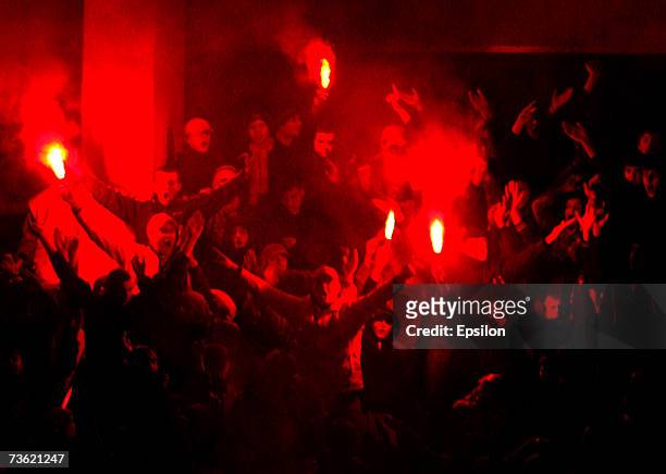 Fans light flares during the Russian Football League Championship match between FC Lokomotiv Moscow and FC Rubin Kazan on March 17, 2007 in Moscow,...