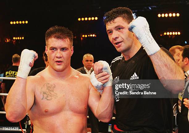 Luan Krasniqi of Germany and Brian Minto of the USA pose for photographers after their WBO Inter-Continental Championship heavyweight fight at the...