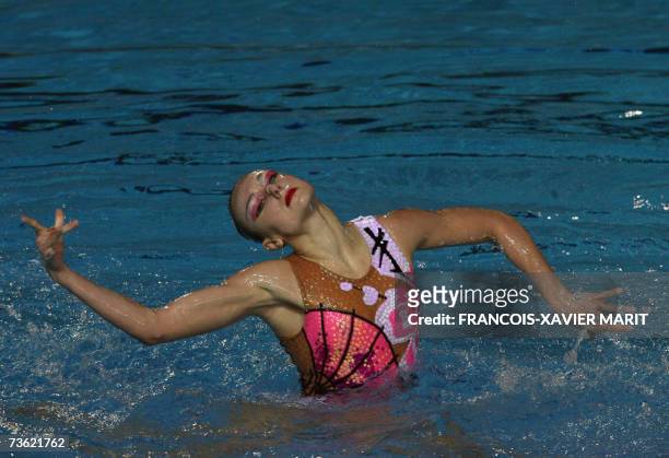 Russian synchro swimmer Natalia Ischenko performs 18 MArch 2007 at the Susie O'Neill pool of the Melbourne Rod Laver Arena during the Solo Free...
