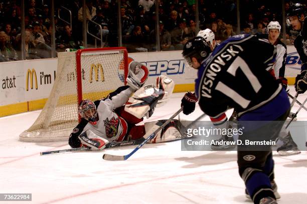 Lubomir Visnovsky of the Los Angeles Kings attempts a shot on goalie Fredrik Norrena of the Columbus Blue Jackets on March 17, 2007 at the Staples...