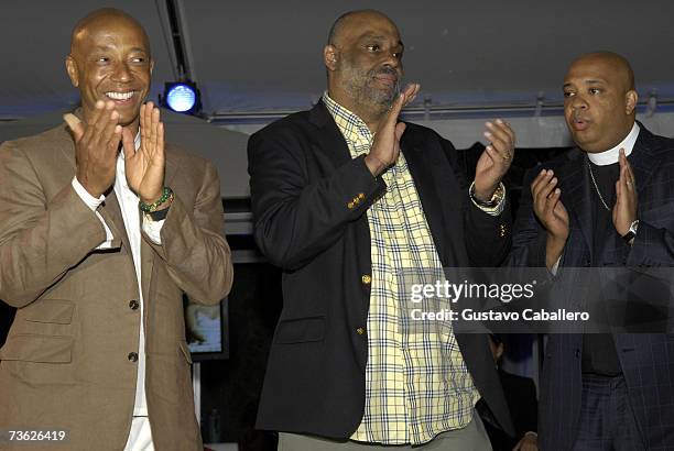 Russell Simmons with brothers, Danny Simmons and Joseph "Reverend Run" Simmons on stage at the Russell Simmons Art For Life Gala on March 17, 2007 in...