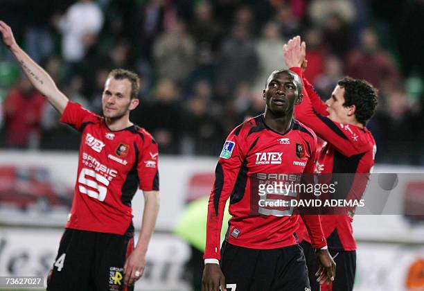 Rennes' midfielders French Olivier Sorlin, Cameroonian Stephane Mbia and French Romain Danze celebrate at the end of the French L1 football match...