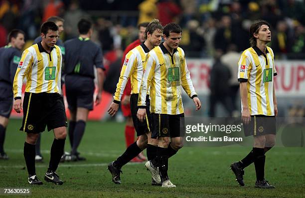 Marc Andre Kruska, Christian Woerns, Alexander Frei and Ebi Smolarek are looking dejected after the Bundesliga match between Borussia Dortmund and 1....