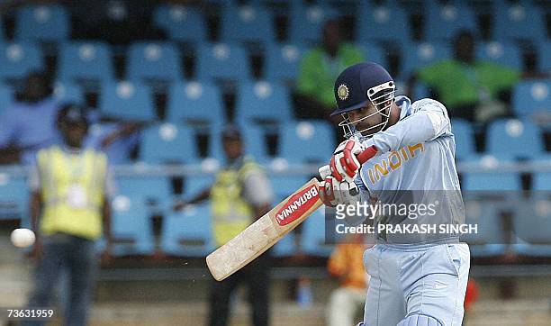 Port-of-Spain, TRINIDAD AND TOBAGO: India Cricketer Virendra Sehwag plays a shot during group stage match between India and Bermuda, at the Queen's...
