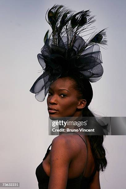 Model wears millinery down the catwalk at Swatch Alternative Fashion Week on March 19, 2007 in London, England. The Swatch Alternative Fashion week...