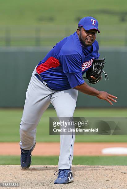 Franklyn German of the Texas Rangers pitches against the Kansas City Royals at Surprise Stadium on March 4, 2007 in Surprise, Arizona.