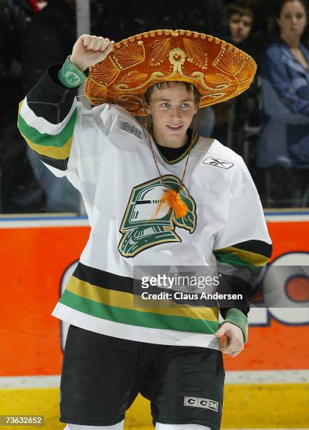 Patrick Kane of the London Knights salutes crowd upon being named first star scoring four goals and adding three assists against the Erie Otters at...