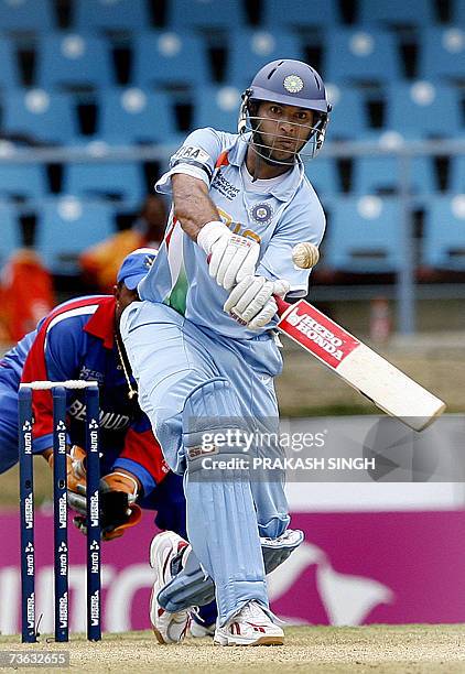 Port-of-Spain, TRINIDAD AND TOBAGO: India cricketer Yuvraj Singh hits a stroke during the Group B Cricket World Cup match between India and Bermuda...