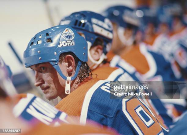 Portrait of Wayne Gretzky of the Edmonton Oilers sitting on the bench during the National Hockey League Smythe Division in the Campbell Conference...