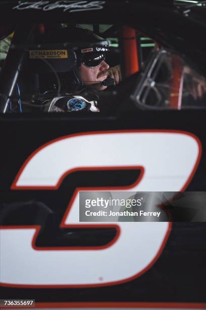 Dale Earnhardt of the United States, sits aboard the GM Goodwrench Service Plus Richard Childress Racing Chevrolet Monte Carlo before the NASCAR...