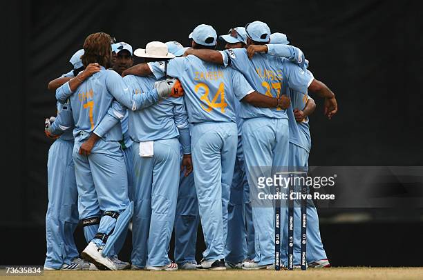The Indian team huddle during the ICC Cricket World Cup 2007 Group B match between Bermuda and India at the Queens Park Oval Cricket Ground on March...