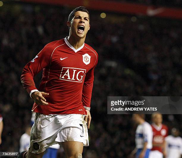 Manchester, UNITED KINGDOM: Manchester United's Cristiano Ronaldo celebrates scoring from the penalty spot against Middlesbrough during their FA Cup...