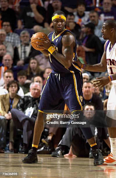 Jermaine O'Neal of the Indiana Pacers looks to move the ball against the Phoenix Suns during the game on March 2 at U.S. Airways Center in Phoenix,...