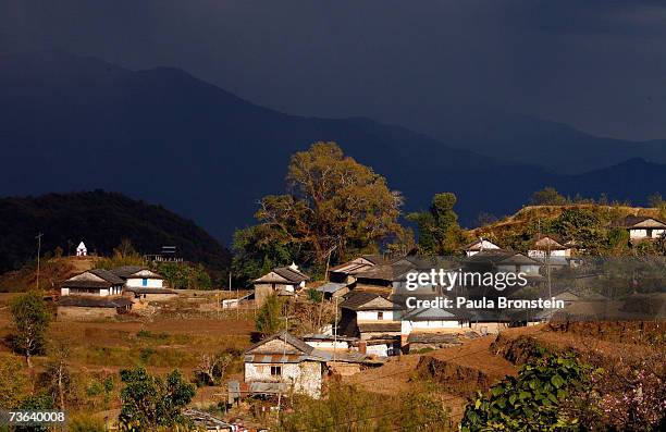 Storm looms over the small mountain village of Dhampus on March 17, 2007 in Nepal. The village is home to many Gurung who are the ethnic majority...
