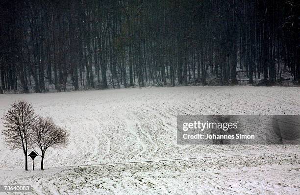 Snow covers a field on March 20 Buchloe, Germany. As temperatures drop, snow returned to southern Bavaria, Austria. Snow caused heavy traffic...