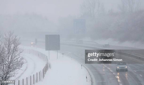 Traffic moves slowly along the motorway A96 on March 20 Buchloe, Germany. As temperatures drop snow returned to southern Bavaria, Austria. Snow...