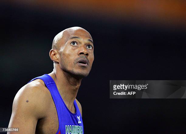 Picture taken 25 August 2004 shows Frankie Fredericks of Namibia waiting for the results in the men's 200m semi-finals race one during the Olympic...