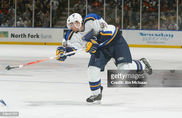 Brad Boyes of the St. Louis Blues shoots the puck against the New York Islanders on March 1, 2007 at Nassau Coliseum in Uniondale, New York. The...