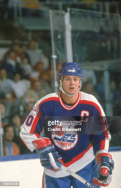 Canadian professional ice hockey player Dale Hawerchuk of the Winnipeg Jets skates on the ice during a road game, 1989. Hawerchuk played for Winnipeg...