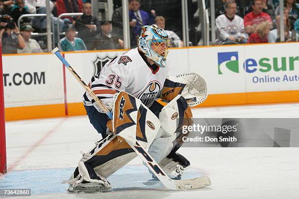 Dwayne Roloson of the Edmonton Oilers follows the action during a game against the San Jose Sharks on March 11, 2007 at the HP Pavilion in San Jose,...