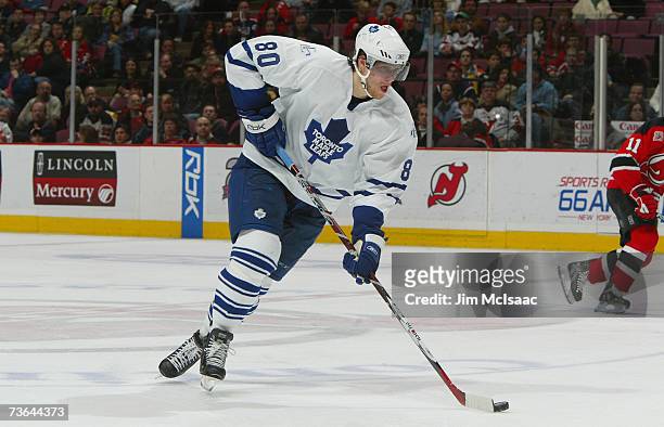 Nik Antropov of the Toronto Maple Leafs skates with the puck against the New Jersey Devils during their NHL game on March 2, 2007 at Continental...
