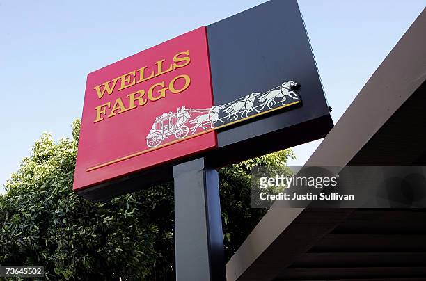 The Wells Fargo logo is seen on a sign outside of a Wells Fargo Home Mortgage branch office March 20, 2007 in San Francisco, California. San...