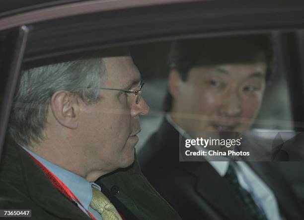 Assistant Secretary of State, Christopher Hill, leaves his hotel to attend meetings of the six-party talks concerning North Korea's nuclear program...