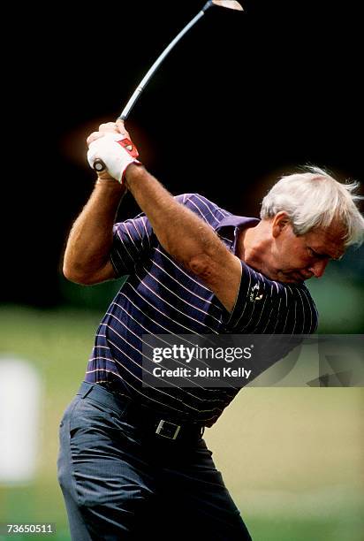 Arnold Palmer muscles a drive down the 13th fairway at the 1984 US Senior Open.