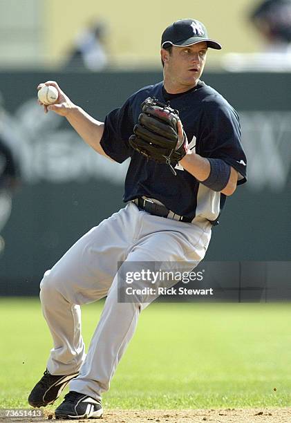 Andy Cannizaro of the New York Yankees fields the ball during a Spring Training game against the Atlanta Braves on March 8, 2007 at The Ballpark at...