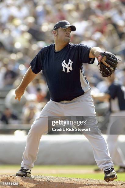 Chris Britton of the New York Yankees delivers the pitch during a Spring Training game against the Atlanta Braves on March 8, 2007 at The Ballpark at...