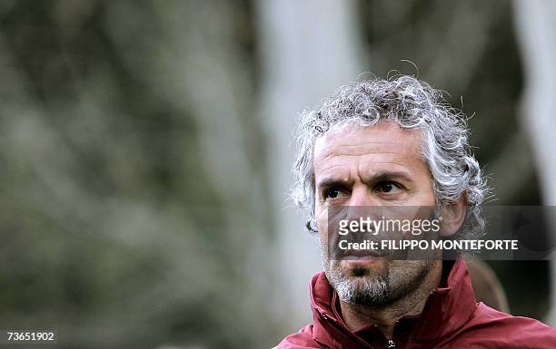 Italy coach Roberto Donadoni looks on prior the afternoon training session at the National Technical Center of Coverciano in Florence, 21 March...