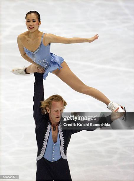 Rena Inoue and John Baldwin of the U.S. Perform in the pairs free program during the World Figure Skating Championships at the Tokyo Gymnasium March...