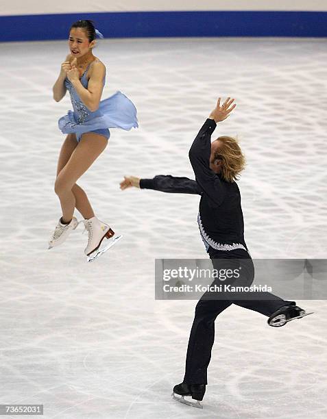 Rena Inoue and John Baldwin of the U.S. Perform in the pairs free program during the World Figure Skating Championships at the Tokyo Gymnasium March...