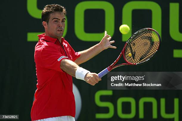 Daniele Bracciali of Italy returns to Max Mirnyi of Belarus during day three at the 2007 Sony Ericsson Open at the Tennis Center at Crandon Park on...