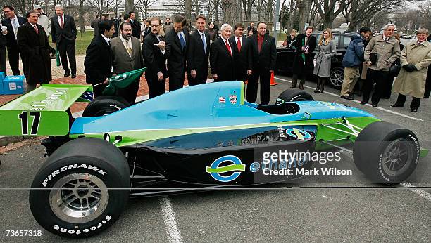 Driver Jeff Simmons stands with Sen. John Thune , Sen. Evan Bayh and Sen. Dick Lugar in front of a race car that runs on ethanol, March 21, 2007 in...